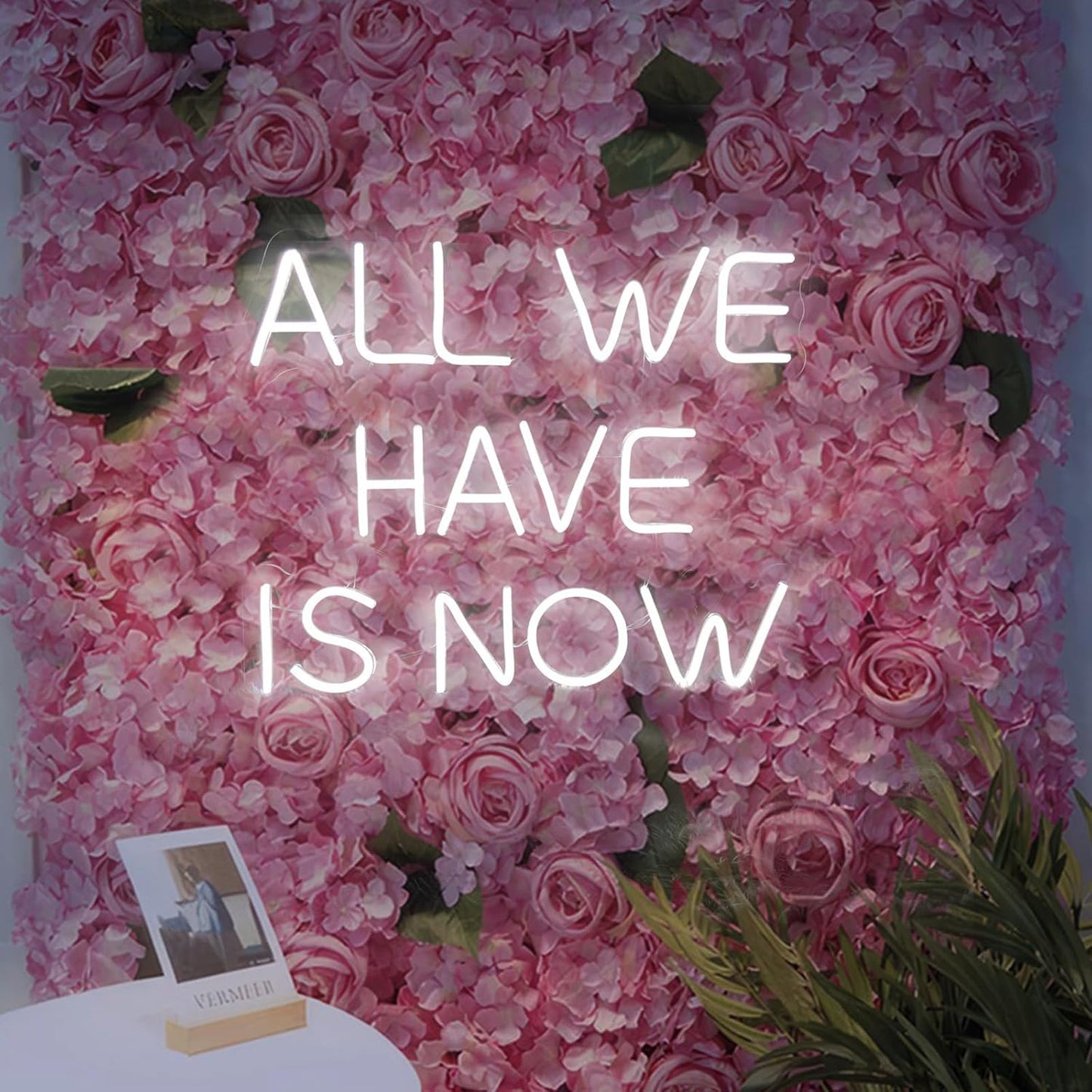 “ALL WE HAVE IS NOW” neon LED sign.