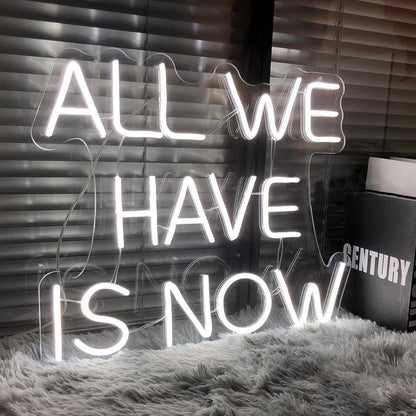 “ALL WE HAVE IS NOW” neon LED sign.